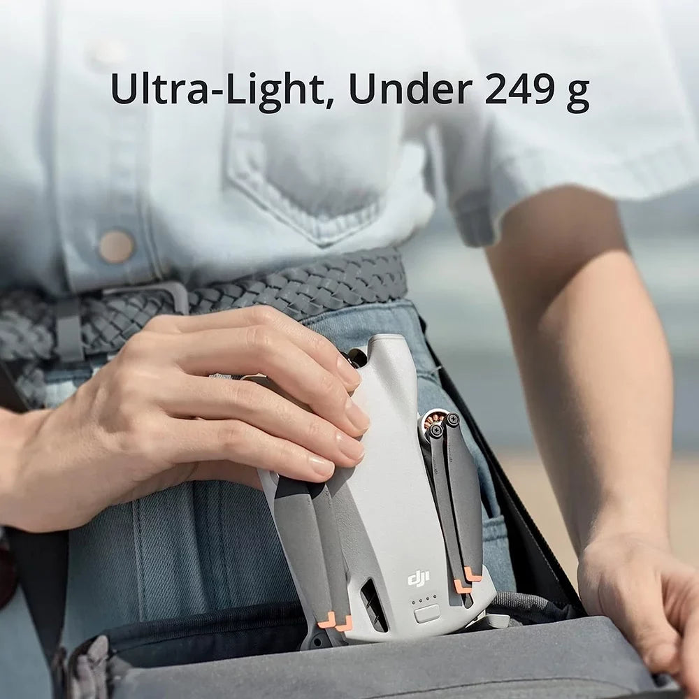 Open Box DJI Mini 3 - Lightweight and Foldable Mini Camera Drone with 4K HDR Video, 38-Min Flight Time, True Vertical Sizehooting, and Intelligent Features